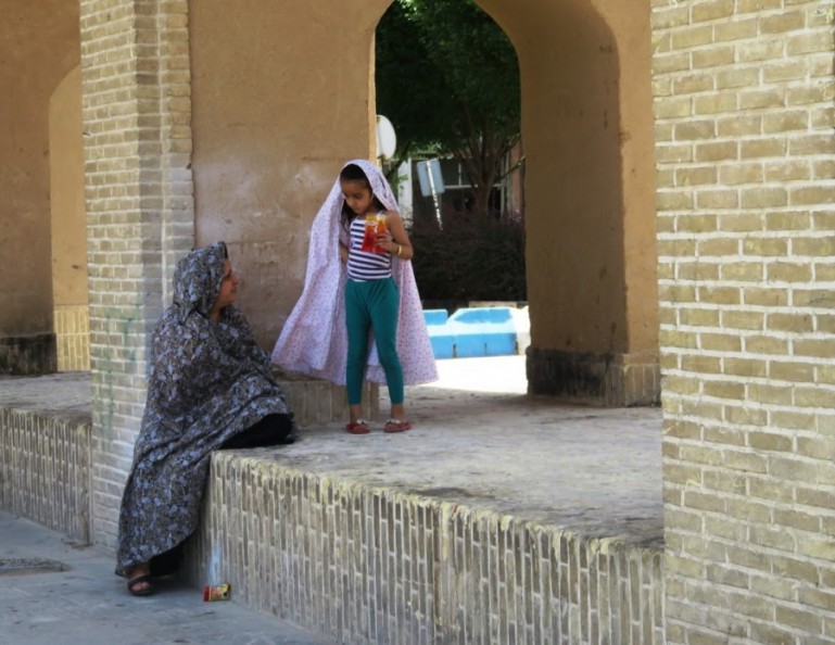 a woman and child in Yazd